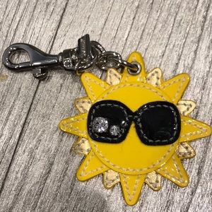 Coach sun keychain